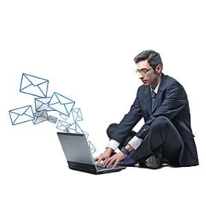 young businessman use laptop to send email